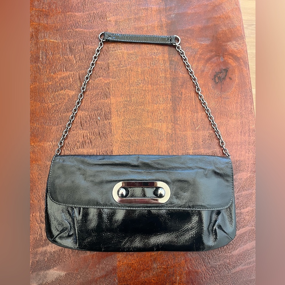 Hobo International black patent leather
Alicia clutch bag gunmetal-tone hardware